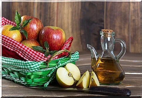 apple and apple vinegar on a table