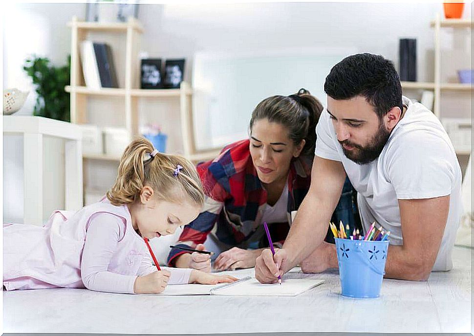 Parents and child doing homework