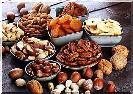 A table full of dried fruits.