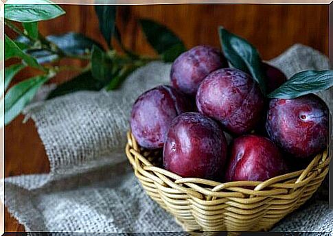 Plums in a basket.